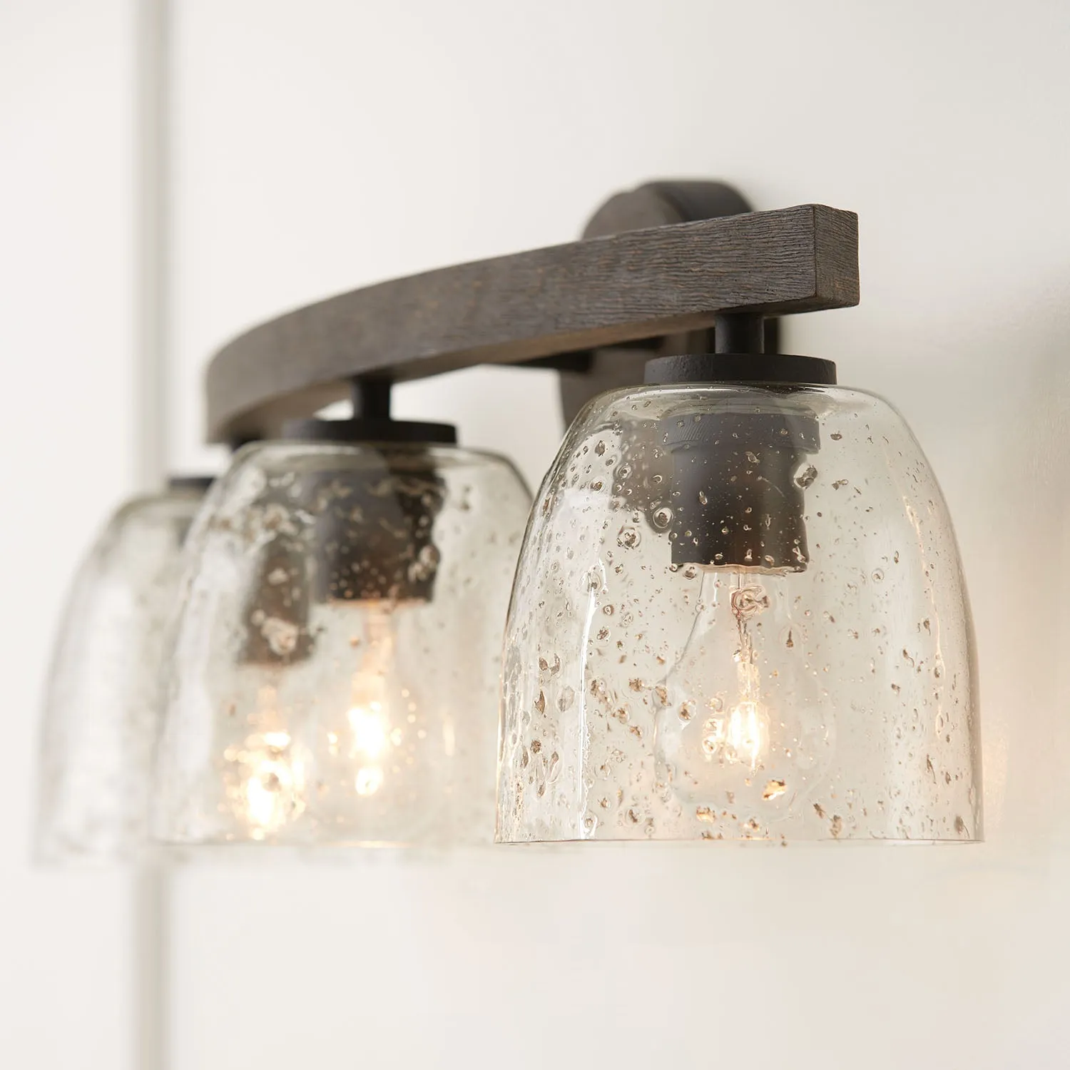 CLIVE 3-LIGHT STONE SEEDED GLASS VANITY
